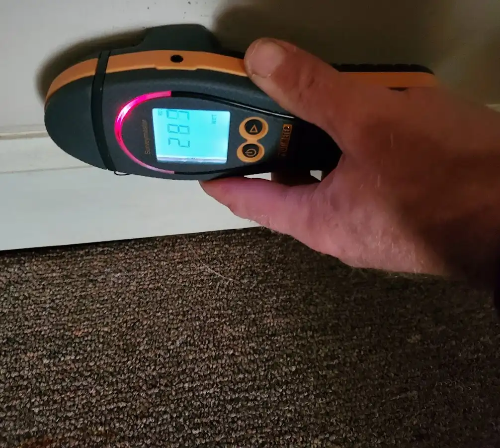 Moisture detection at baseboard during Burst Pipe Cleanup in La Verne